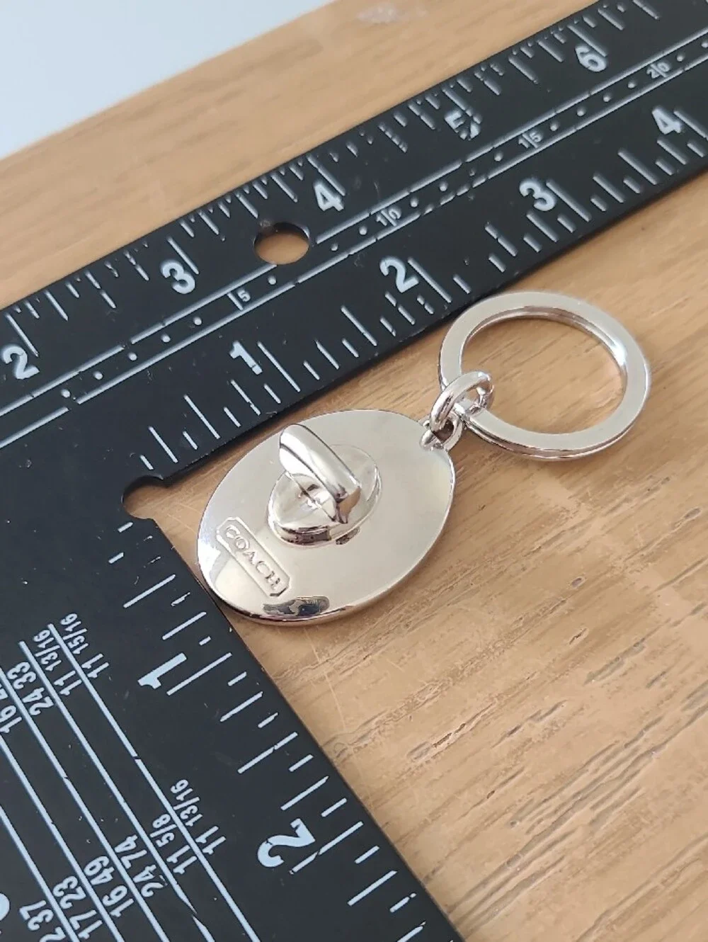 Coach Silver Oval Turnlock Keyring
